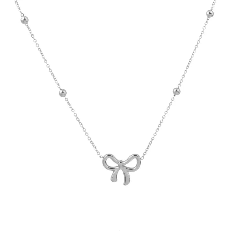 Collier ras du cou avec pendentif nœud papillon